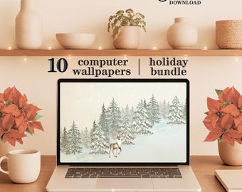 May include: A laptop displays a winter scene with a deer and snow-covered trees. The image is part of a holiday bundle of 10 computer wallpapers. The scene is set on a wooden desk with decorative items and a poinsettia plant.