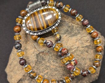 El collar con colgante de plata 925 Tiger Iron es de Tiger Iron, citrino y hematita plateada.