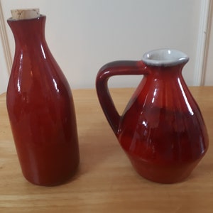 Small bottle and pitcher in red enamelled stoneware