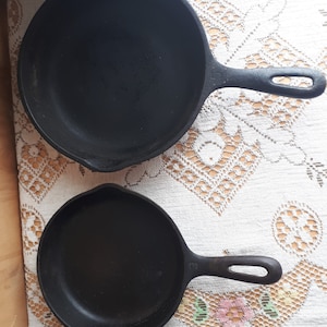 2 cast iron stoves