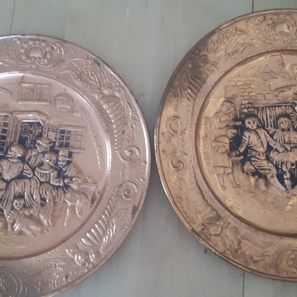 Pair of embossed copper wall plates