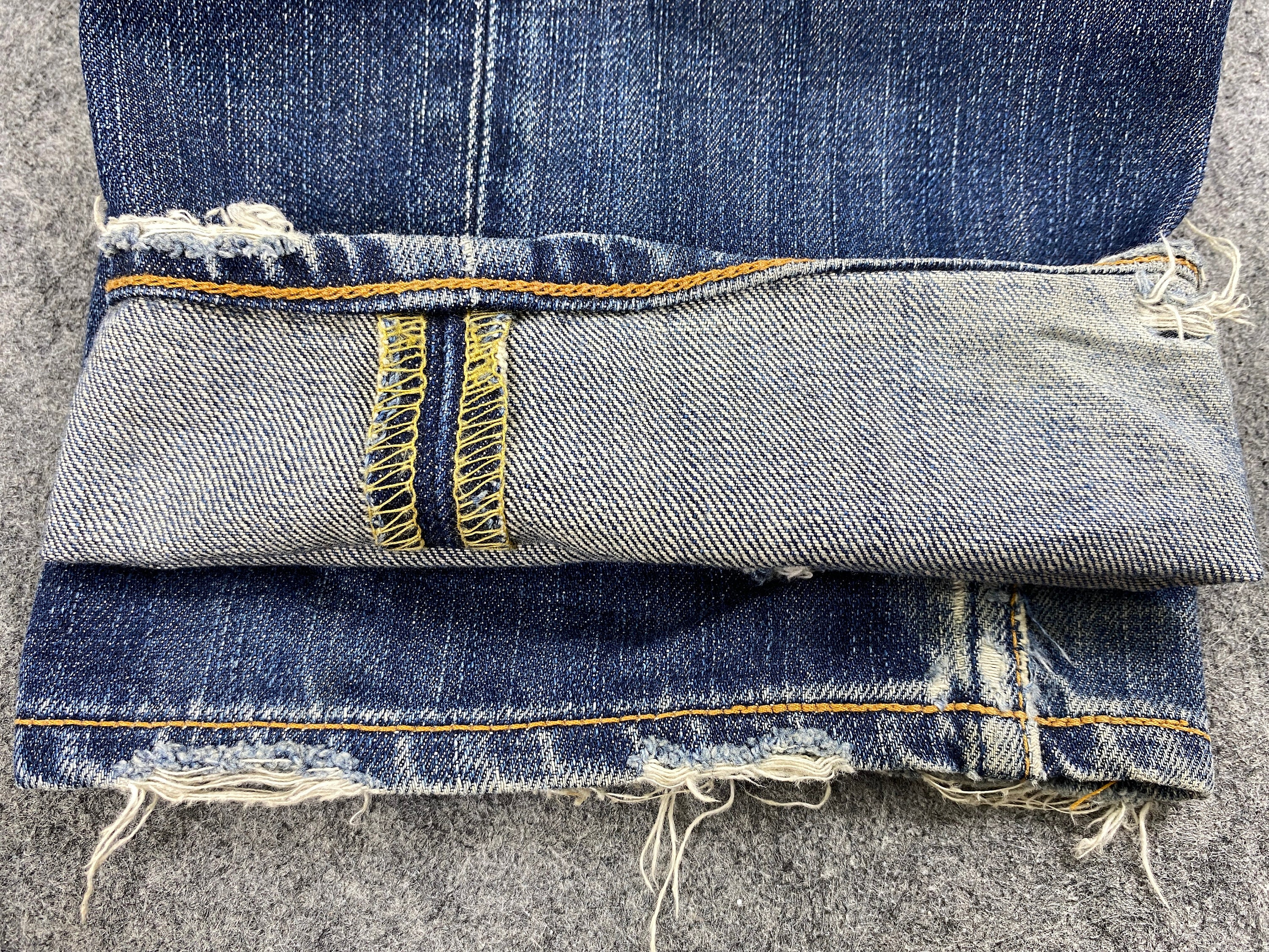 Kleding Gender-neutrale kleding volwassenen Jeans maat 32 vintage levi's 702 gesp terug distressed conditie 