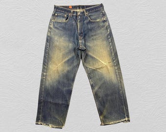 Talla 33x29. Jeans Levi's 569 vintage de pierna recta holgada, desgastados y con efecto bigotes. Estilo streetwear de los 90, fabricados en EE. UU., de mezclilla holgada y ropa de trabajo resistente.