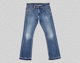 Jeans Levi's 527 Bootcut de tiro bajo, talla W32 L30, lavado azul, estilo vintage, para hombre, desgastados, desteñidos, estilo urbano estadounidense.