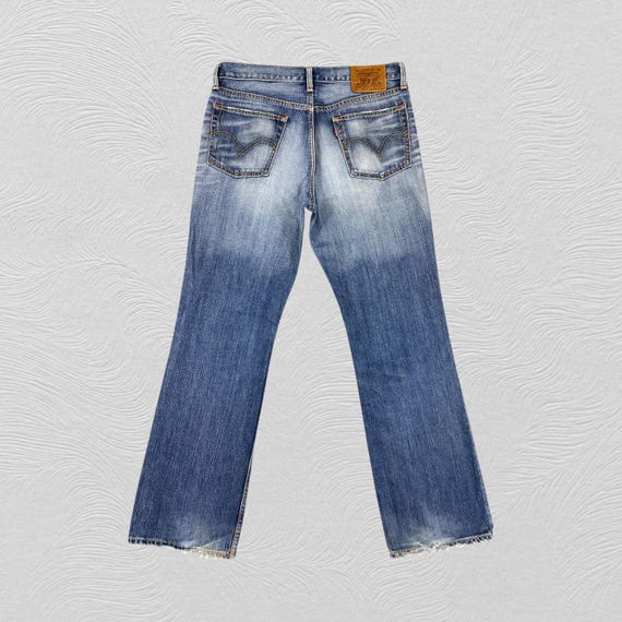 34x32 Vintage Levi's 707 Flare Distressed Whisker Denim