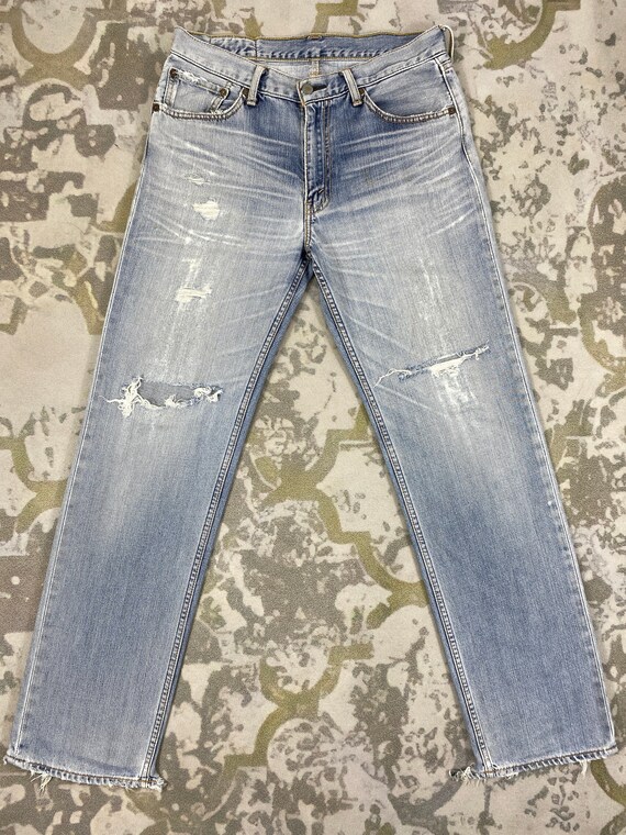 Levi’s 702 00s Damage Denim Pant Levi's 702 00s Damage Denim Pant