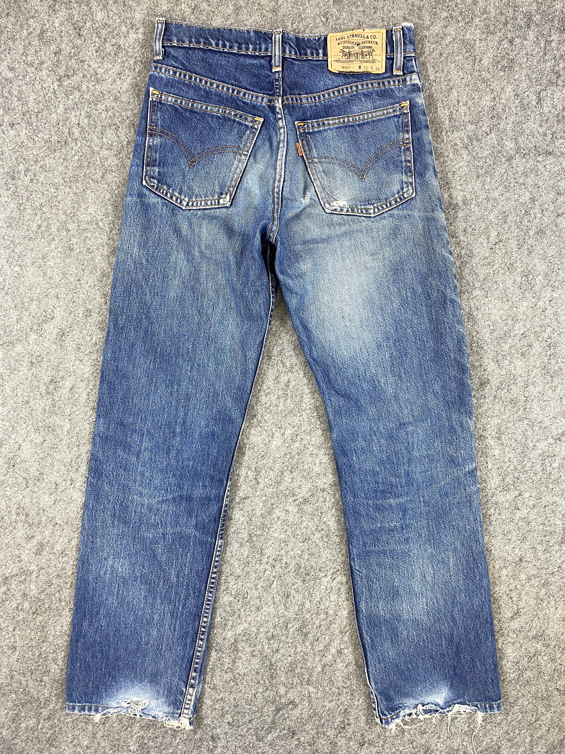 Vintage Levi s 607 Orange Tab Jeans 29x29 Blue Distressed Denim