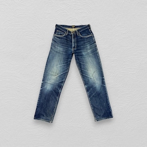 May include: A pair of blue denim jeans with a faded wash and a straight leg fit.