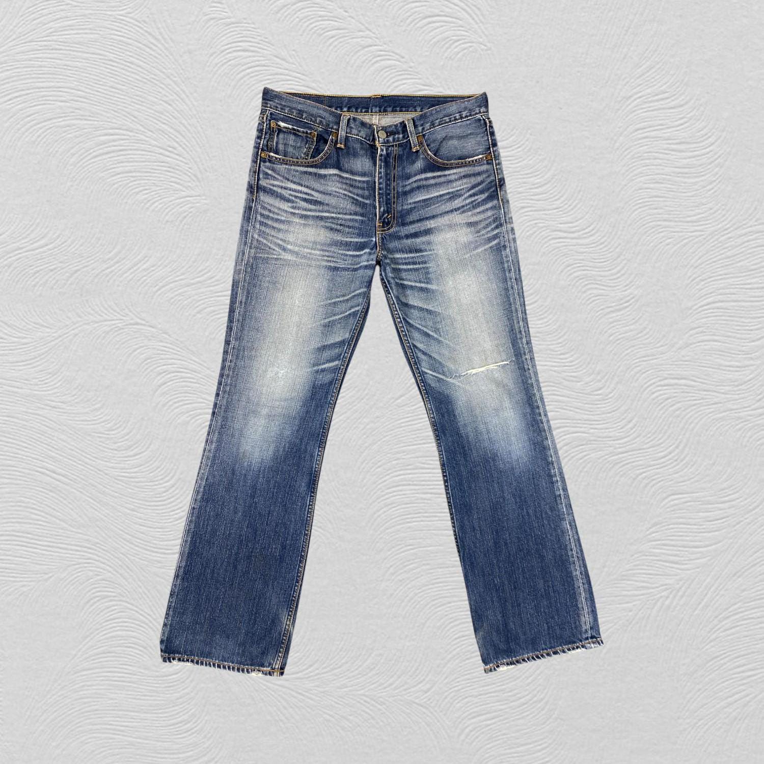 34x32 Vintage Levi's 707 Flare Distressed Whisker Denim