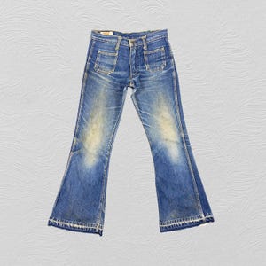 29x32.5 Vintage Levi's 502 Jeans Faded Blue Denim Red Tab