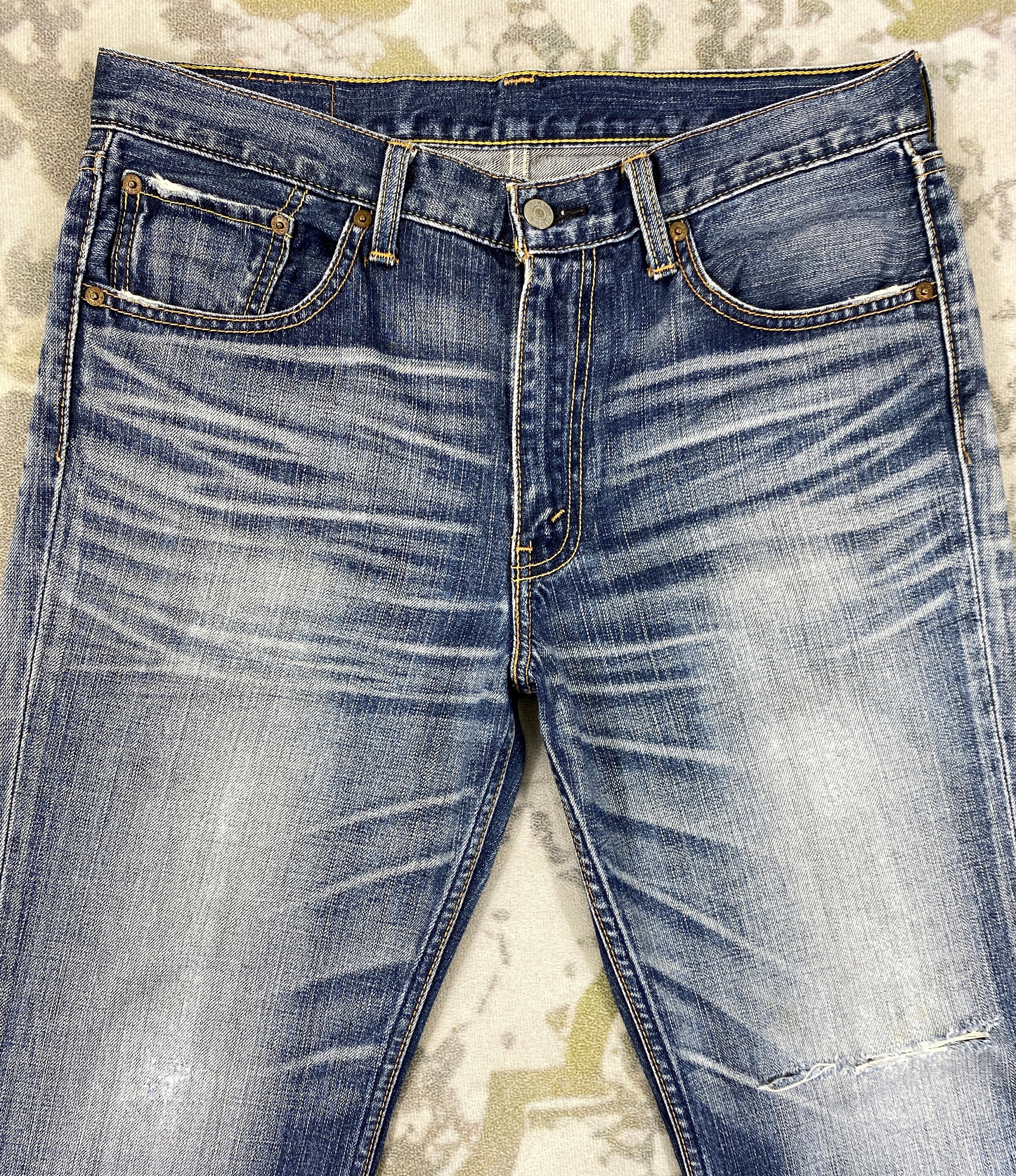 34x32 Vintage Levi's 707 Flare Distressed Whisker Denim