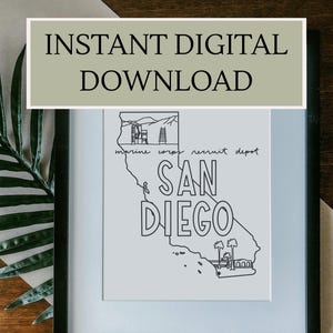 Può includere: Stampa incorniciata in bianco e nero raffigurante la costa di San Diego. Le parole "Instant Digital Download" sono in alto. La parola "San Diego" è in grandi lettere. Le parole "marine corps recruit depot" sono in basso.