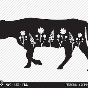 May include: Silhouette of a black cow with white flowers and leaves inside the outline of the body. The cow is walking to the right.