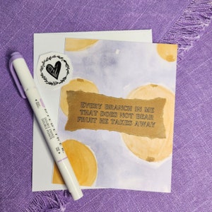 May include: A watercolor card with a quote from the Bible: "Every branch in me that does not bear fruit he takes away." The card has a light blue background with yellow watercolor circles and a brown paper texture overlay.