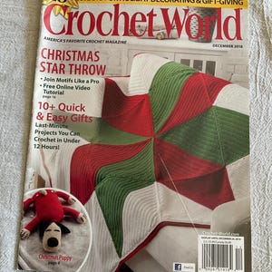 May include: The cover of Crochet World magazine, December 2018 issue, features a Christmas Star Throw crochet project in red, green, and white. The magazine also highlights quick and easy gift projects and a Christmas puppy crochet pattern.