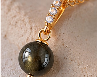 Ciondolo in ossidiana con riflessi dorati: collana placcata in oro 18 carati