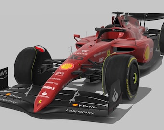 Può includere: Un'auto da corsa di Formula 1 rossa e nera con il numero 16 sul lato. L'auto è sponsorizzata da marchi come Shell, Kaspersky e Santander.
