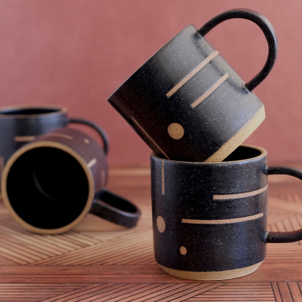 Handmade Ceramic Mug with Geometric design in black on speckled clay