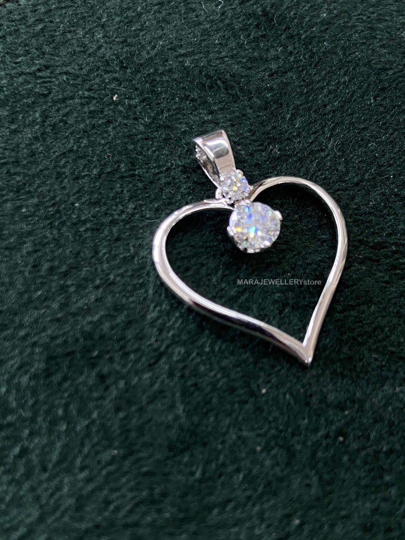 heart Shape pendant,
Moissanite pendant,
solid gold pendant,
halo design pendant,
925 silver pendant,
anniversary gift,
Valentine's Day gift,
gift for her,
Engagement Pendant,
Wedding Pendant,
Solitaire Pendant,
Diamond Pendant,
Birthday Gift