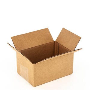 May include: An open rectangular cardboard box made of brown corrugated paper. The box features four top flaps that are folded outward, revealing the hollow interior. A small piece of clear adhesive tape is visible on the front lower corner.