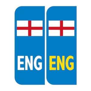 May include: Two blue rectangular signs with the text "ENG" in white and yellow letters. Each sign features a red cross on a white background.