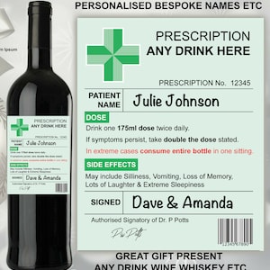 May include: A personalized prescription label for a bottle of wine or other beverage. The label features a green cross, the text "Prescription Any Drink Here", and a space for the patient's name, dose, and side effects. The label also includes the text "Great Gift Present Any Drink Wine Whiskey Etc."