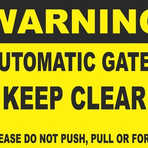 May include: Yellow warning sign with black text that reads "WARNING AUTOMATIC GATES KEEP CLEAR PLEASE DO NOT PUSH, PULL OR FORCE".