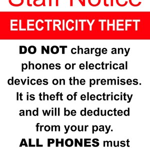 May include: A red and black sign with the text "Staff Notice" and "ELECTRICITY THEFT". The sign states "DO NOT charge any phones or electrical devices on the premises. It is theft of electricity and will be deducted from your pay. ALL PHONES must be switched off!"