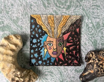 抽象的な肖像画、葛藤する感情の芸術