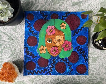 鮮やかな花のフェイスアート：サイケデリックなボヘミアン風壁飾り