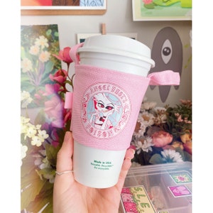 Hazbin Hotel Angel Dust’s Poison Reusable Drink Sleeve