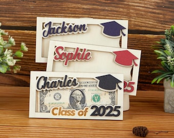 May include: Three wooden frames with graduation caps and the names Jackson, Sophile, and Charles. The bottom frame has a dollar bill with the text "Class of 2025".