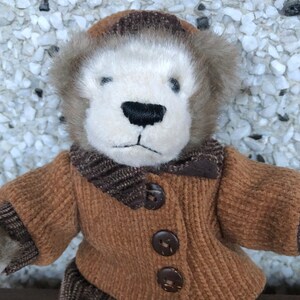 Orso d&#39;epoca con cappotto e pantaloni