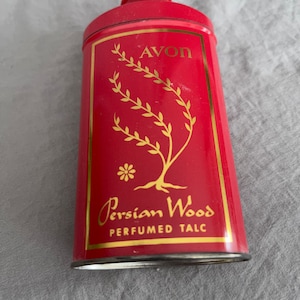 Vintage Avon Persian wood talc 1/2 full