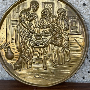 Vintage brass family dinner plate wall hanging made in England