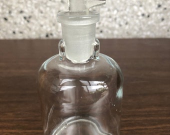 Vintage clear glass bottle CW USA