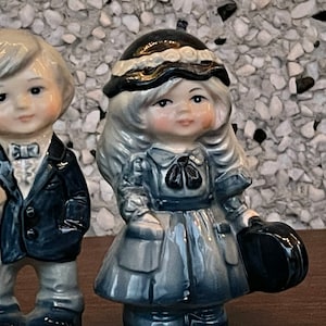 Beautiful vintage boy and girl figurines
