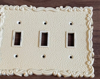 Vintage white plastic triple light switch cover