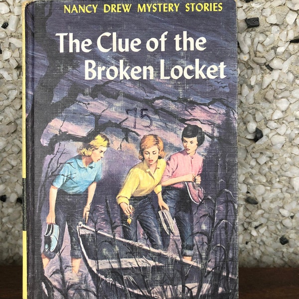 The Clue of the Broken Locket