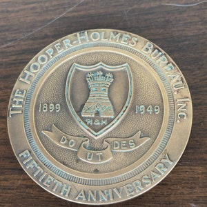 Vintage brass hooper Holmes bureau inc 50th anniversary medal