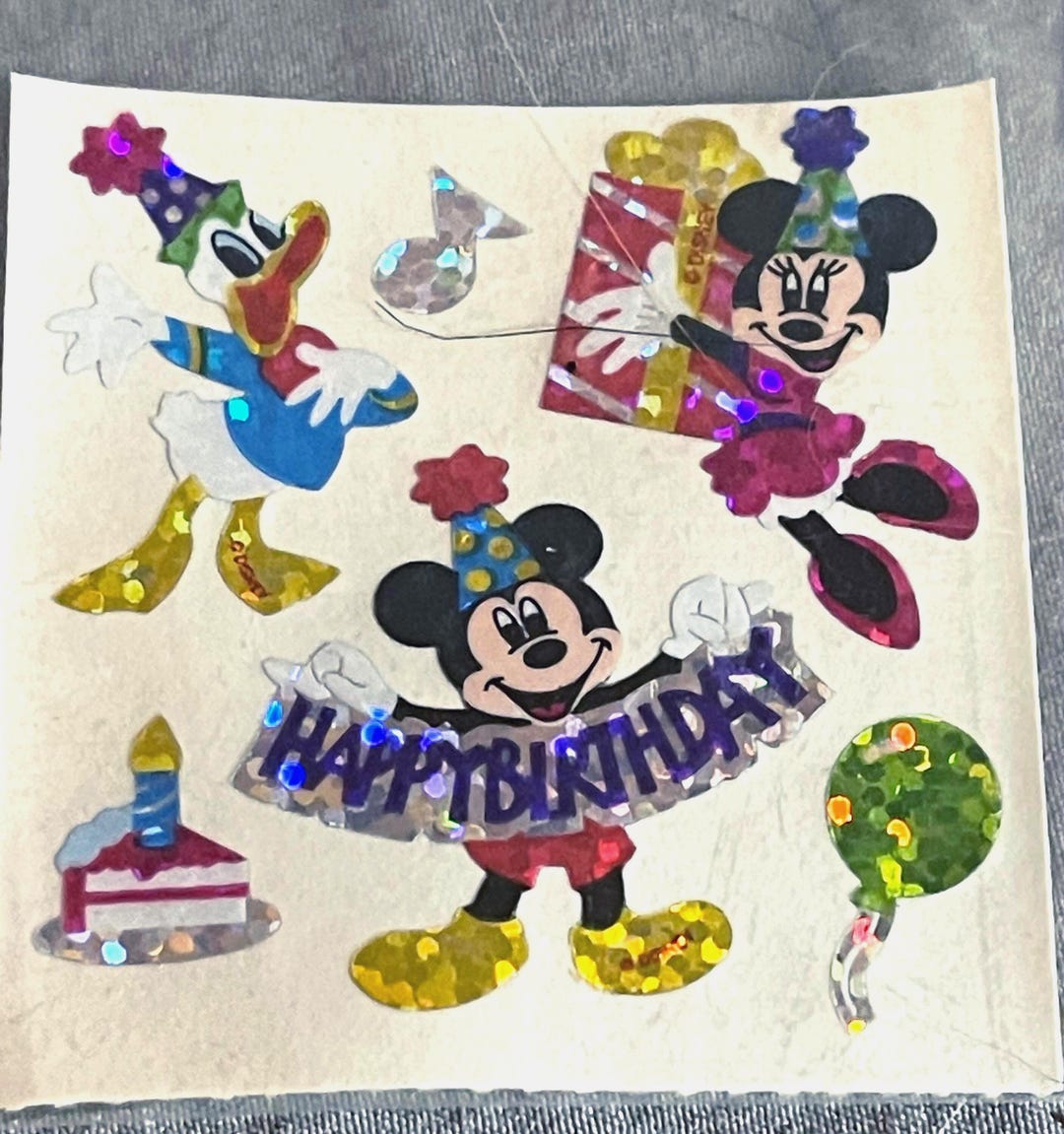 ミッキーとミニーマウスのサンディライオンプリズマティックバースデー