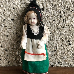 White porcelain vintage doll