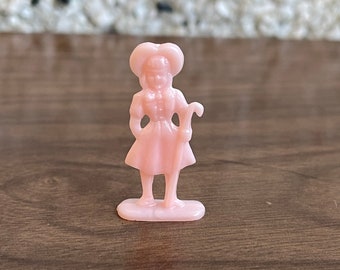 Chica de plástico rosa