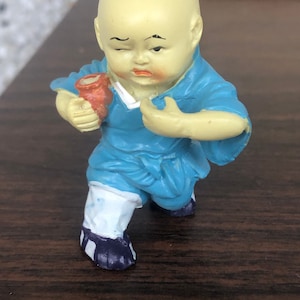 Monk resin figurine
