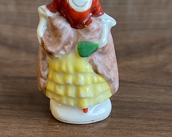 Vintage porcelain woman figurine
