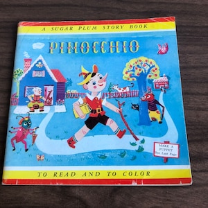 Vintage 1950’s Pinocchio coloring book ( couple pages colored )