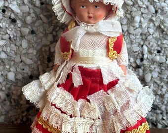 vintage dovina doll red dress with lace