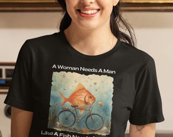 Una mujer necesita a un hombre como un pez necesita una bicicleta.