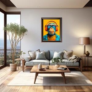 May include: A framed art print featuring a monkey wearing headphones and glasses against a yellow background. The monkey is depicted with blue and orange tones, wearing a blue jacket. The artwork is displayed in a living room setting.