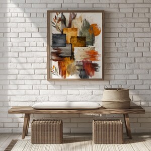 May include: Abstract art print in a wooden frame. The artwork features a composition of overlapping rectangular shapes in shades of brown, orange, gray, and green. A round orange shape is also visible. The print is displayed above a wooden bench.